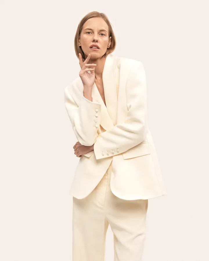 Ivory suit jacket and trousers